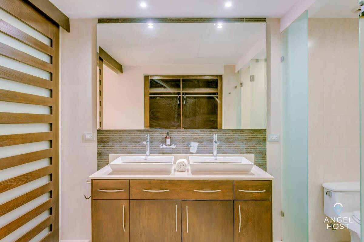 Сasa de vacaciones Zen Beachfront Condo, Pool, Gym, Golf, Club *