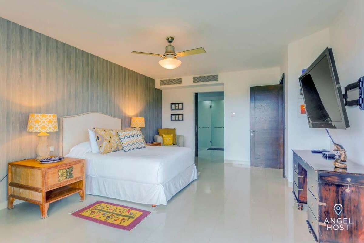 Сasa de vacaciones Zen Beachfront Condo, Pool, Gym, Golf, Club
