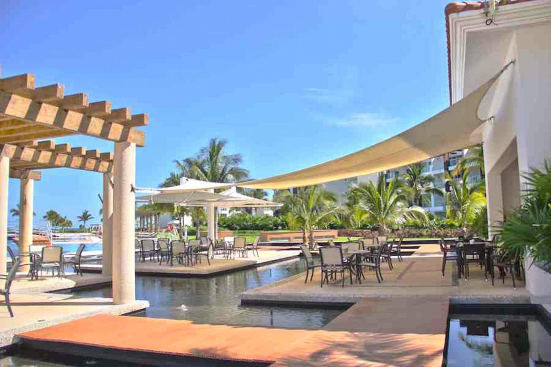 Zen Beachfront Condo, Pool, Gym, Golf, Club Сasa de vacaciones *