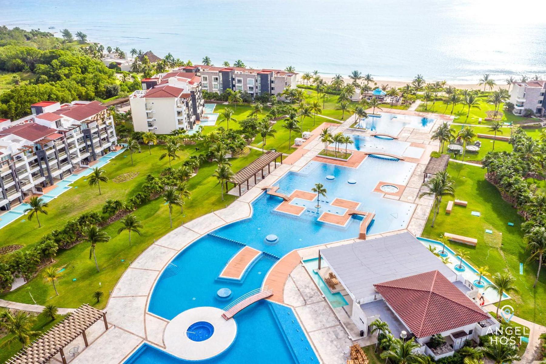 Zen Beachfront Condo, Pool, Gym, Golf, Club Сasa de vacaciones *